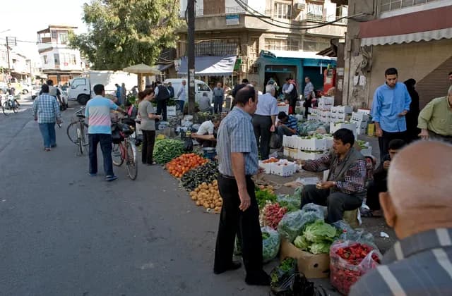 People and produce stalls along Al Armin street in Damascus, September 2008