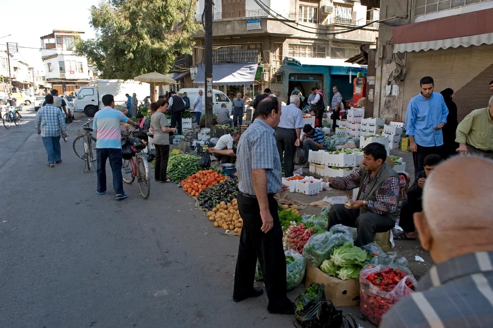 People and produce stalls along Al Armin street in Damascus, September 2008