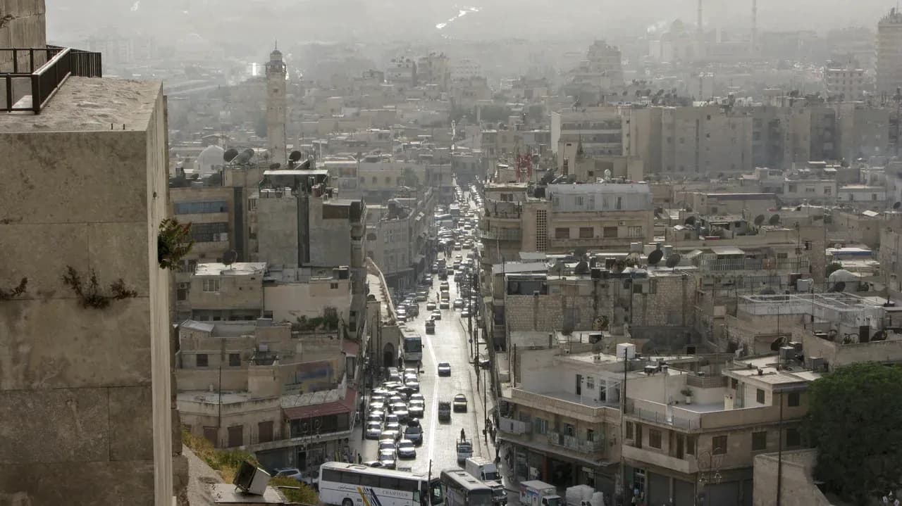 Archive view over a busy central Aleppo street and surrounding buildings, photographed by Vyacheslav Argenberg on 21 August 2008.