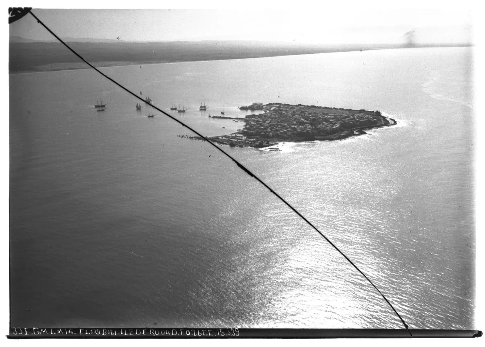 Black-and-white oblique aerial archive photograph of Arwad island and the Syrian mainland coast, March 1939