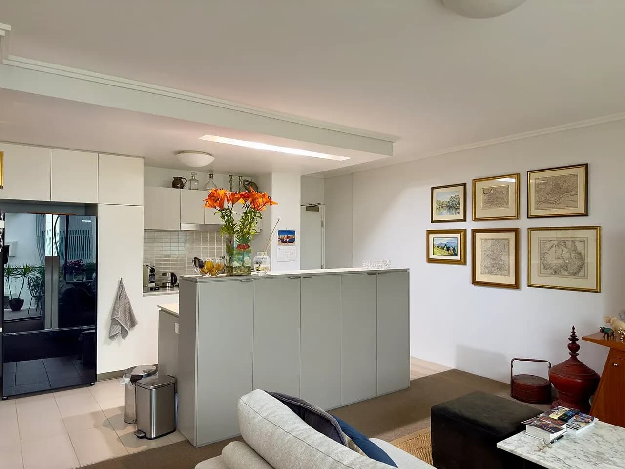 Kitchen cabinets and room connections in a Brisbane apartment, June 2025