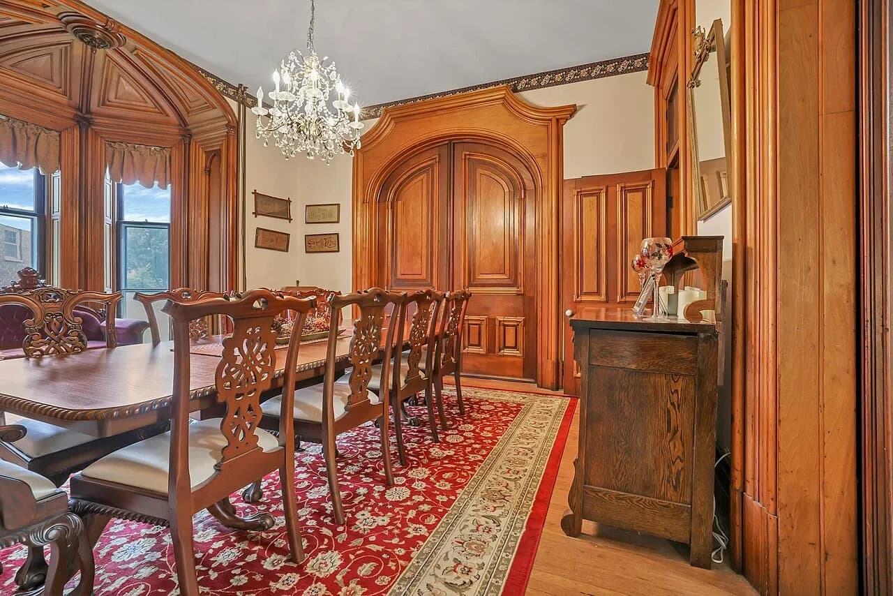 Dining room with wooden doors and window trim in the Samuel N. Patterson House, September 2022