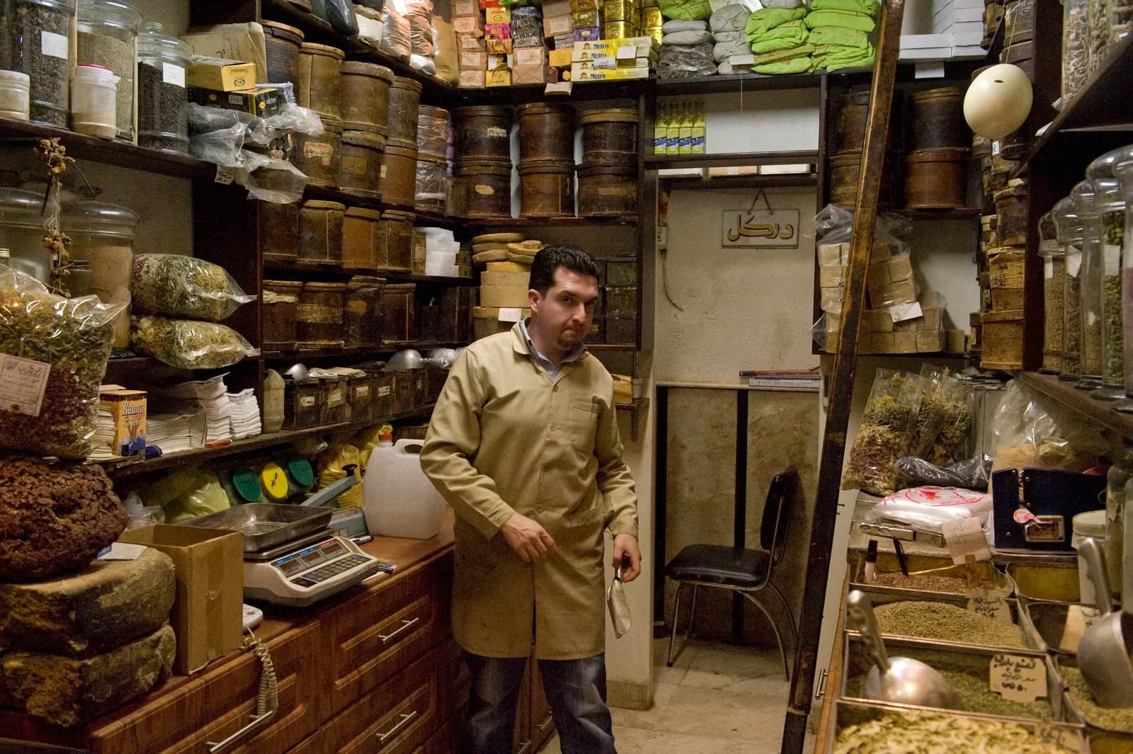Shelves, counter and scales inside a shop identified with Suq Midhat Paşa in Damascus, April 2009