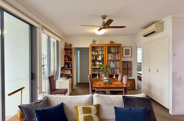 Dining area with visible room doors and glazed outdoor connection in Brisbane, June 2025