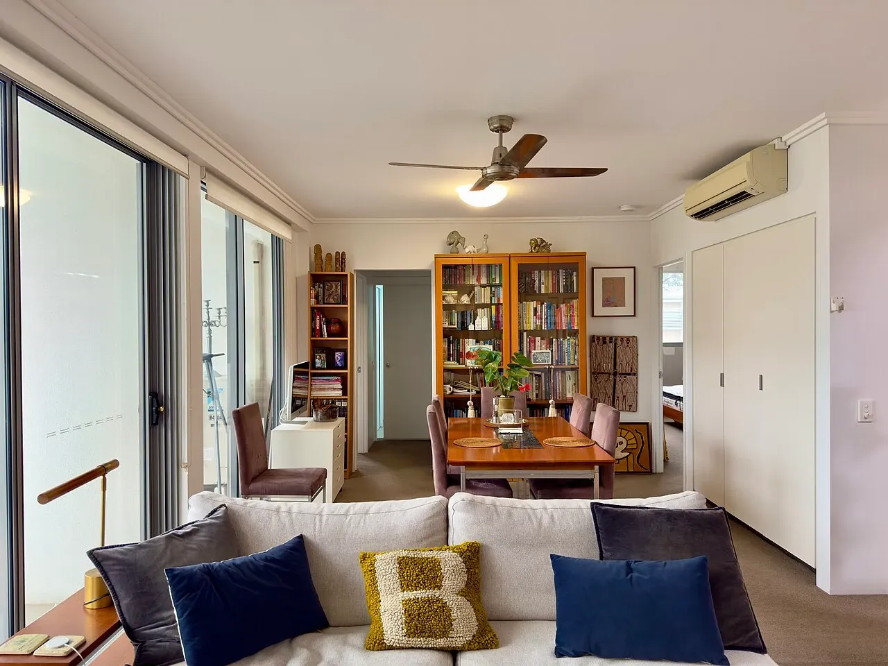 Dining area with visible room doors and glazed outdoor connection in Brisbane, June 2025