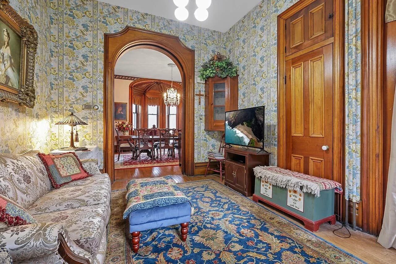 Sitting room connected to a dining room in the Samuel N. Patterson House, September 2022