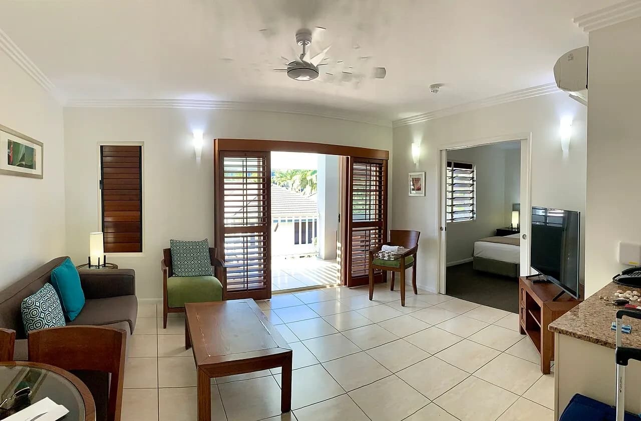 Open living and kitchen area at accommodation in Port Douglas, Australia