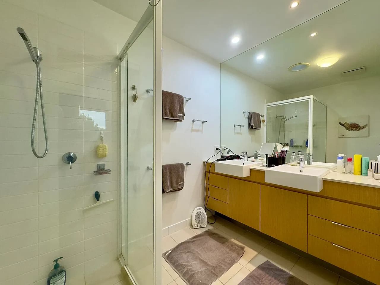 Bathroom vanity and glass shower in an apartment in Brisbane, Australia
