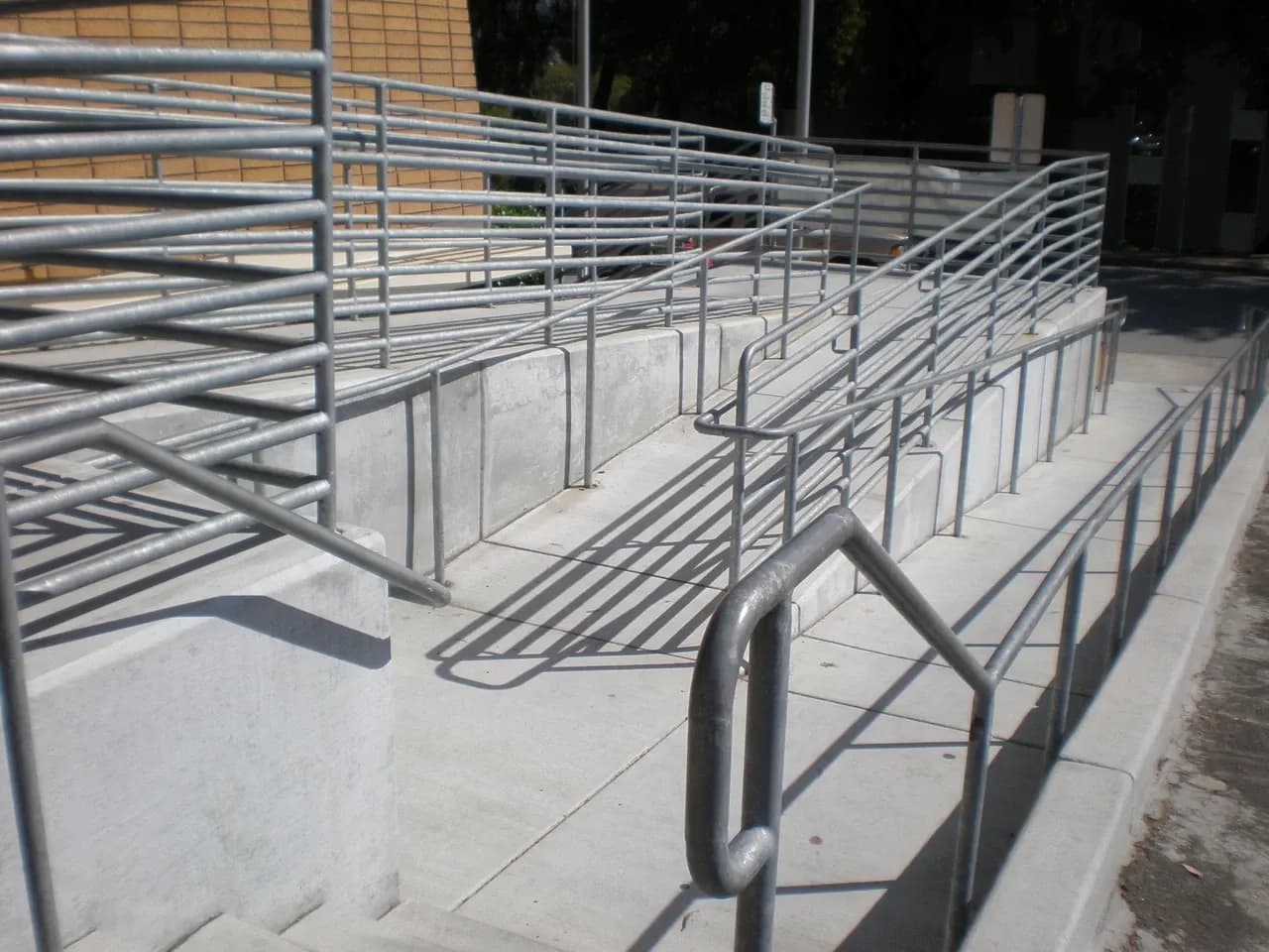 Ramped approach with metal rails at South San Francisco Main Library, California, photographed in April 2008