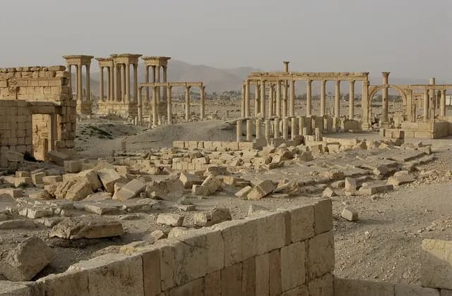 Palmyra's colonnaded avenue with standing columns and lower masonry, August 2008 archive photograph