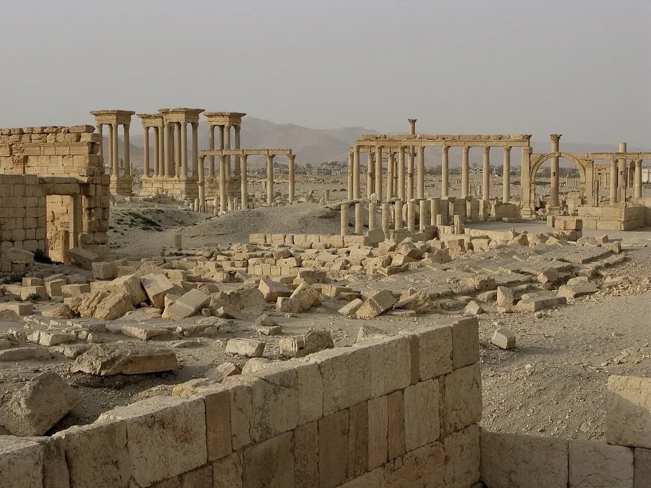 Palmyra's colonnaded avenue with standing columns and lower masonry, August 2008 archive photograph