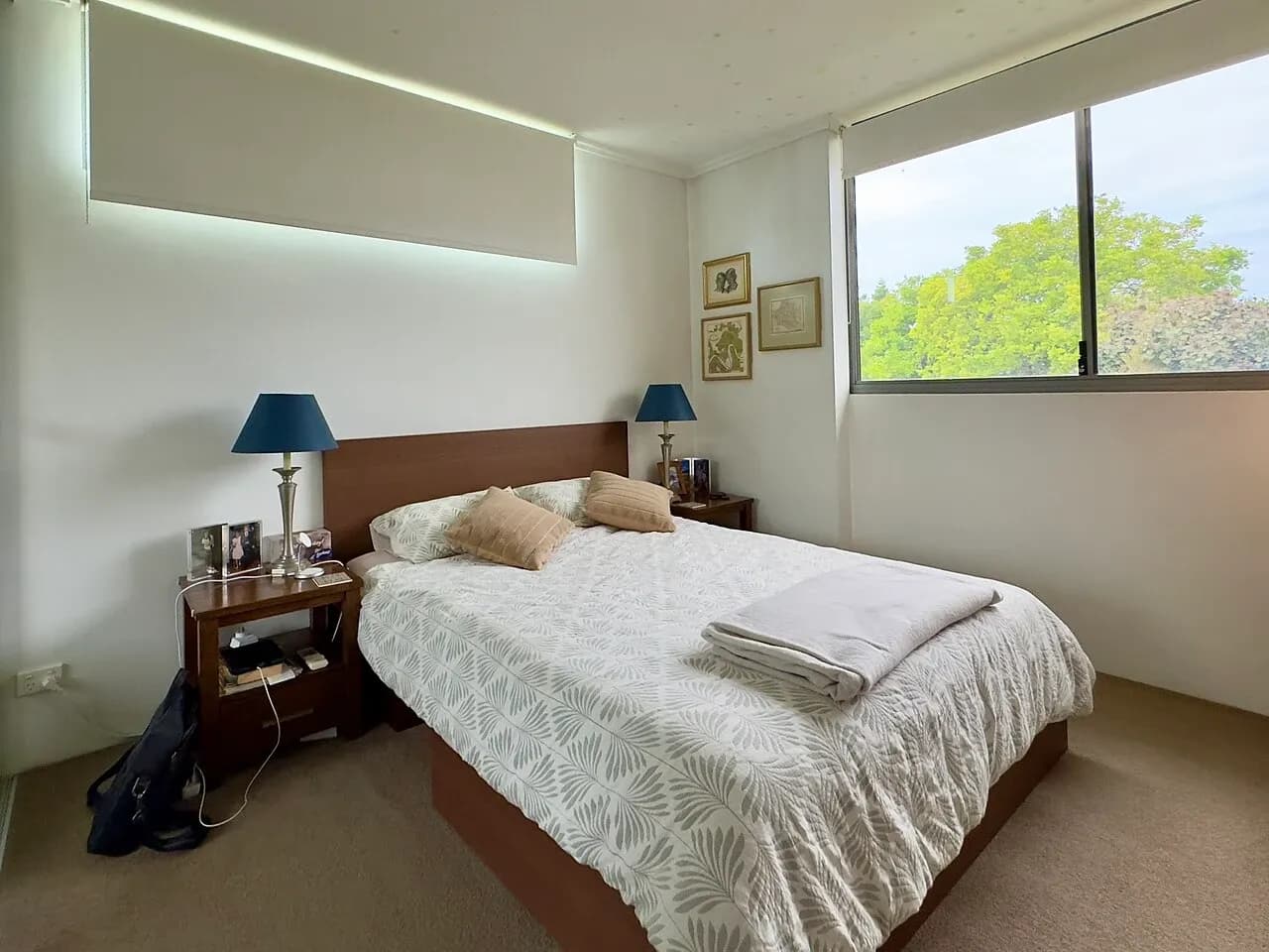 Furnished bedroom with two visible windows in Brisbane, June 2025