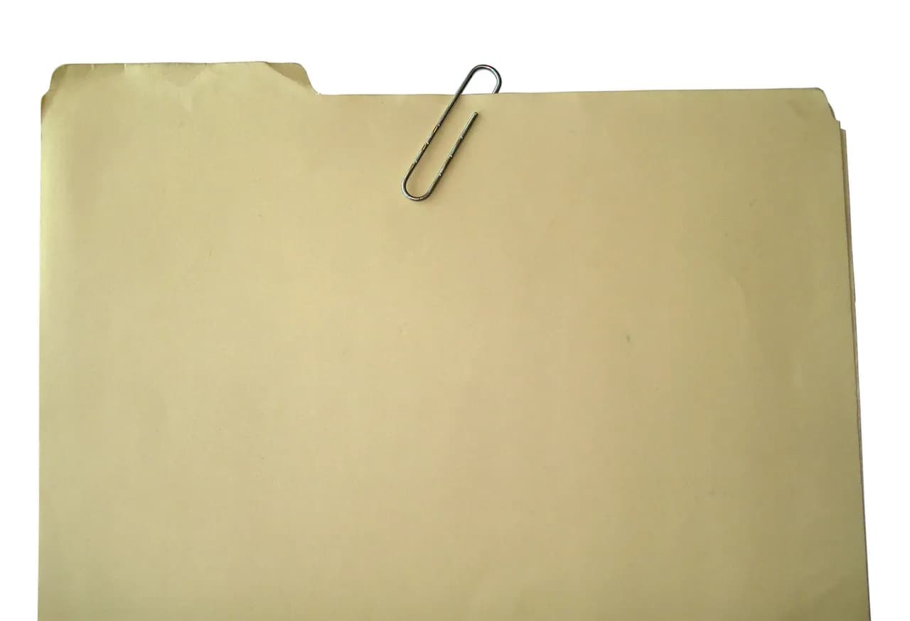 Manila document folder with a paperclip, photographed in July 2009