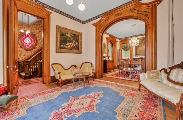 Connected furnished rooms and doorways in the Samuel N. Patterson House, September 2022