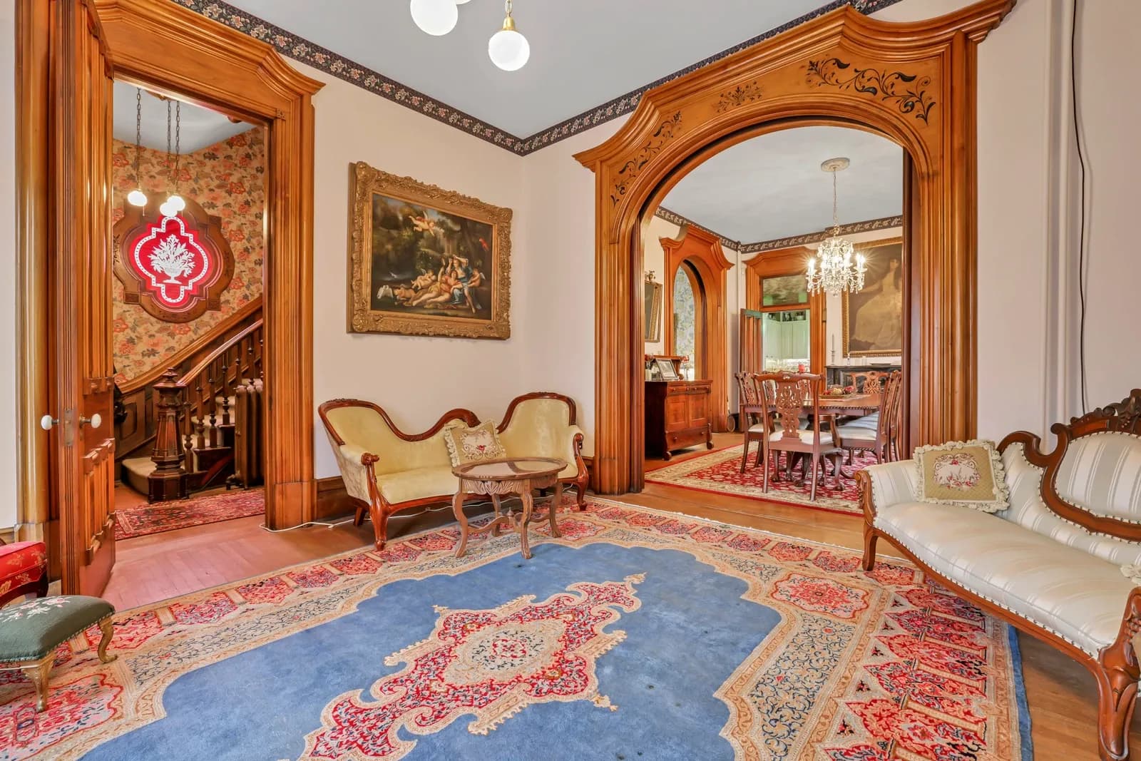 Connected furnished rooms and doorways in the Samuel N. Patterson House, September 2022