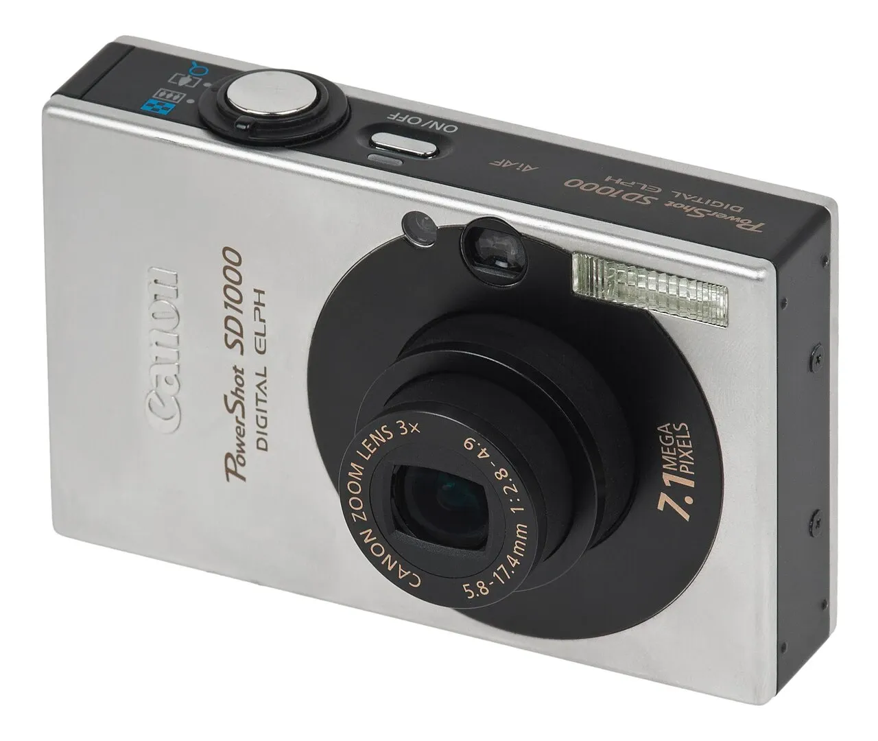 Silver compact digital camera with its lens extended on a white background