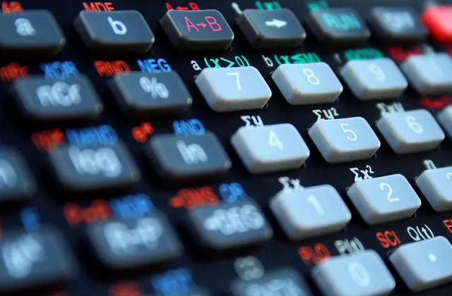 Close view of numeric and percentage keys on a scientific calculator, photographed in June 2009